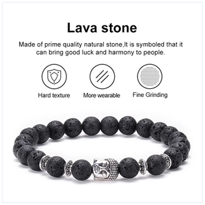 Detailed macro view of black lava stone beads with silver metal lion head charm details