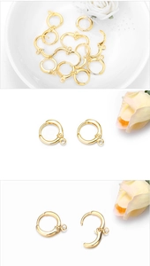 Macro detail of golden circular earring clasps for DIY jewelry making in three views