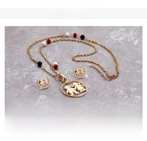 Titanium steel necklace and earrings set featuring boy and girl charms with colorful beads