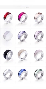 Selection of stainless steel rings with colorful faceted glass stones in twelve colors