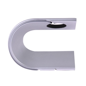Macro shot of silver aluminum U-shaped charging stand for Apple Watch 9/8/7