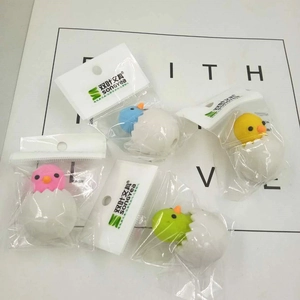 Top view of creative cartoon chick erasers in pink, blue, yellow, and green colors