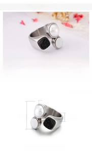 Detail view of 8mm wide stainless steel ring with shell and faux diamond inlay specs