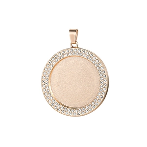 Detailed view of rose gold round pendant featuring a double row of sparkling white rhinestones
