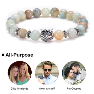 Detailed beaded owl charm bracelet shown in various lifestyle and gift wearing scenes
