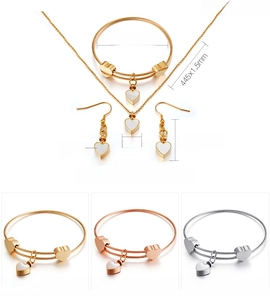 Detailed dimensions of heart jewelry set featuring white shell inlay and 18K gold plating