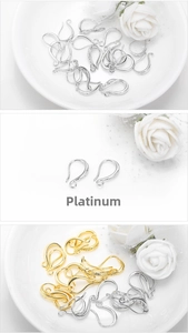 Detailed close-up of gold and white gold plated metal ear hooks for DIY jewelry making
