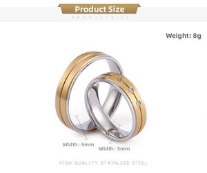 Macro detail of 5mm matte gold and silver stainless steel rings with zircon inlay