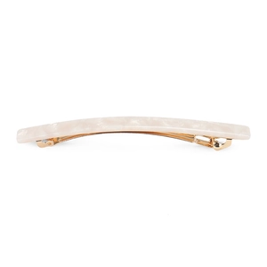 Close-up of marble texture cream acetate hair clip with golden metal spring base