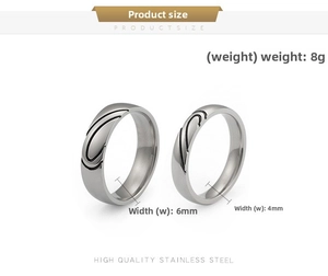 Detail view of 6mm and 4mm stainless steel rings with matching heart engraving