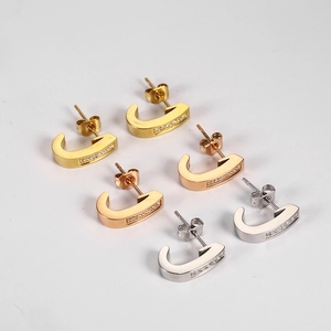 Creative C-shaped hoop earrings with inlaid diamonds in gold, silver, and rose gold