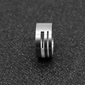 Stainless steel jump ring opener tool for DIY jewelry making on dark background