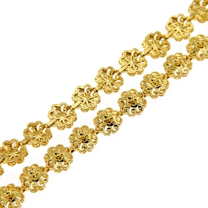 Elegant gold flower bracelet featuring detailed hollow blossom links on a white background