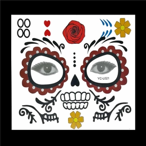 Macro detail of waterproof Day of the Dead face tattoo with floral and skull patterns