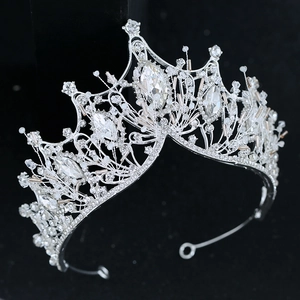 Luxurious silver bridal crown with sparkling rhinestones and delicate handmade pearls