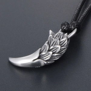 Retro dragon scale tiger tooth pendant in titanium steel with black woven rope