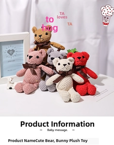 Detail of five mini knitted teddy bears with silk bows in various colors for bag charms
