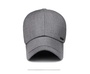 Front view of grey minimalist cotton baseball cap featuring a black rectangular logo patch