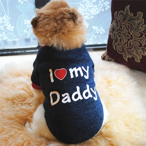 Detail of navy blue pet hoodie with red trim and I Love my Daddy print on soft rug