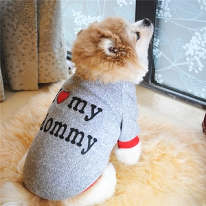 Detail of grey pet fleece hoodie with I love my Mommy text on a sitting dog
