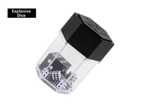 Macro view of exploding dice magic prop showing a large die turning into mini white dice