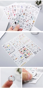 Detail of transparent PET travel stickers featuring London and Paris watercolor motifs