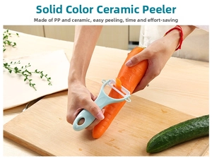 Close-up of ceramic peeler skinning a carrot with ergonomic light blue handle