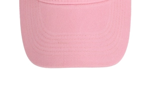 Close-up detail of the pink baseball cap brim showing neat stitching and textured fabric.