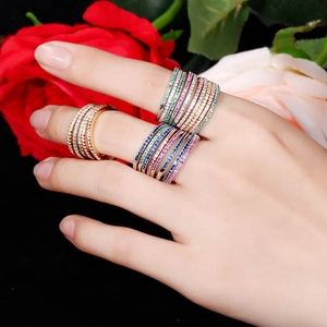 Stackable eternity bands with multi-colored AAA cubic zirconia in gold and silver finishes