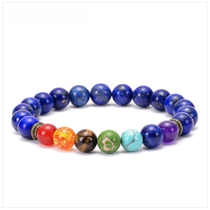 Close-up of natural lapis lazuli beads with chakra stones and vintage metal spacers
