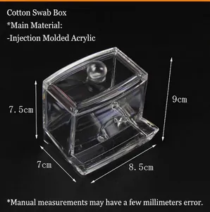 Detailed view of clear acrylic cotton swab organizer with lid and bottom dispensing slot