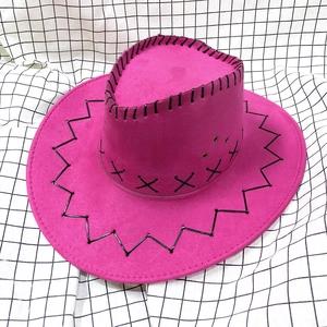 Detail of rose red cowboy hat with black stitching and metal vents on checkered fabric