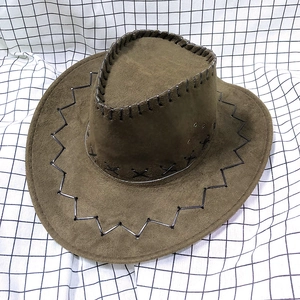 Detail view of brown cowboy hat featuring distinctive black cross-stitch embroidery on brim