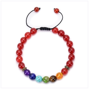 Detail showing colorful 7 chakra stones on adjustable black braided rope bracelet