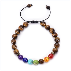 Detailed macro view of seven chakra beads on adjustable tiger eye stone bracelet