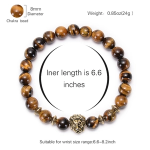 Natural tiger eye stone beaded bracelet featuring a golden lion head charm and 8mm beads