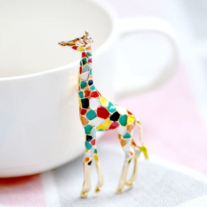 Cute giraffe brooch with colorful enamel patterns on golden metal frame for women