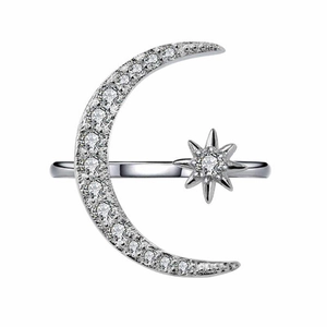 Polished silver star and crescent moon open ring featuring shimmering pavé set crystals