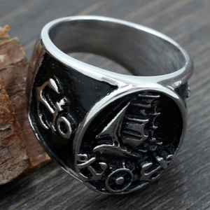 Vintage nautical signet ring in silver stainless steel featuring embossed sailing ship design