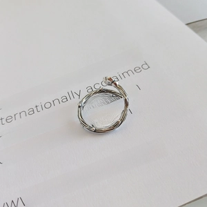 Macro view of 925 sterling silver ring with realistic branch texture and small bud detail