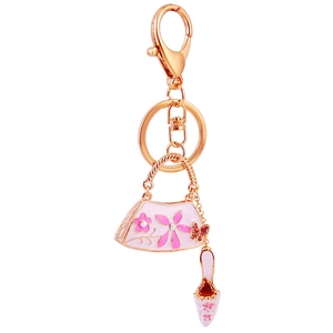 Rose gold handbag and high heel keychain with pink floral enamel and crystal charms