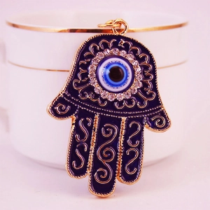Hamsa Hand keychain with blue enamel evil eye and sparkling rhinestones on gold metal