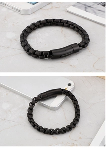 Detail of matte black titanium steel motorcycle chain bracelet with magnetic clasp