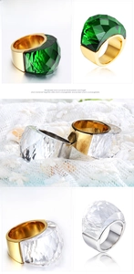 Detail of 18K gold plated ring with emerald green multifaceted cut glass stone