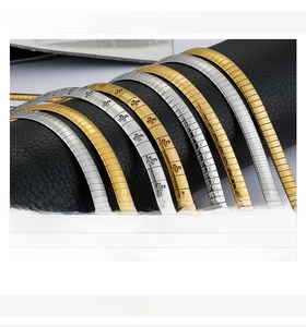 Detail of 6mm stainless steel snake chain necklace in 18K gold and silver tones