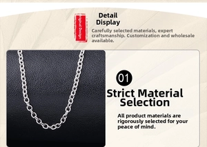 Detail of silver-colored O-chain link necklace with metallic luster on leather texture
