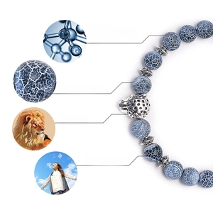 Blue weathered agate beaded bracelet with silver leopard head and negative ion features