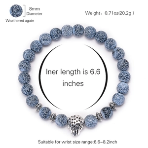 Weathered blue agate 8mm beaded bracelet featuring a silver leopard head center piece