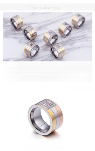 Detail view of 12mm wide stainless steel ring with colorful square cubic zirconia inlay