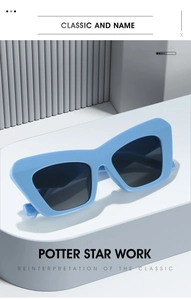 Detail view of light blue cat eye sunglasses with thick frames and dark UV lenses